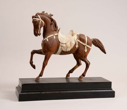 Carved and polychrome wooden horse 

20th-century...