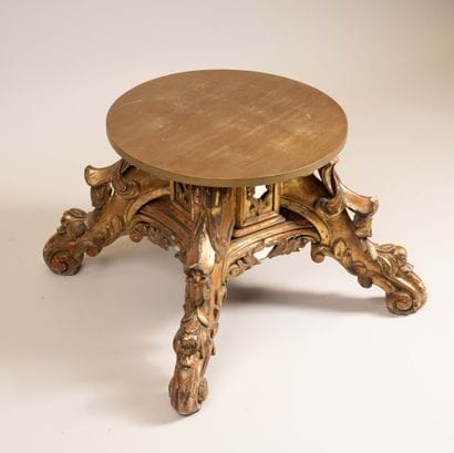 Molded, carved, and gilded wooden candelabra...