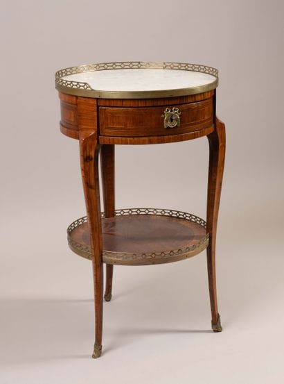 Circular table in rosewood veneer set within...