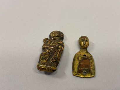 Set of four gilt repoussé copper wall sconces,...