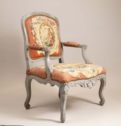 Armchair with a queen-style backrest made...