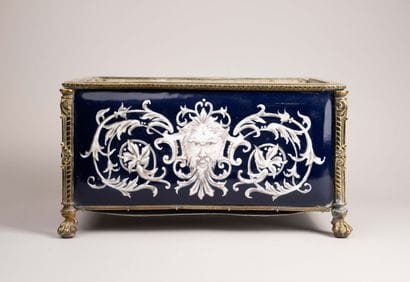 Varnished bronze planter with an enameled...
