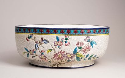 LONGWY 
Jardinière en faïence polychrome...