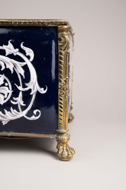 Varnished bronze planter with an enameled...