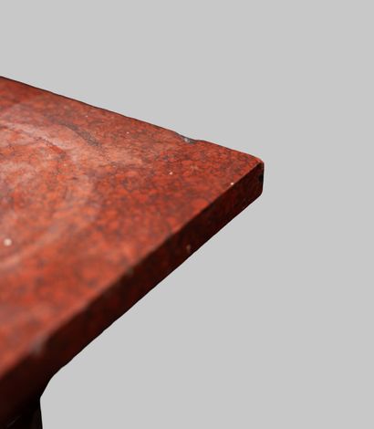 Fluted red marble column with an octagonal...