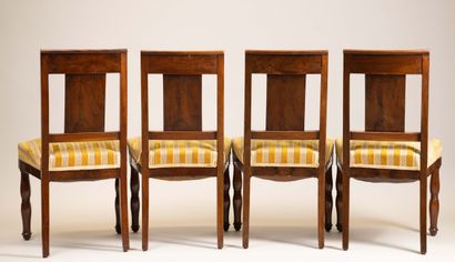 A set of four chairs with mahogany panel...