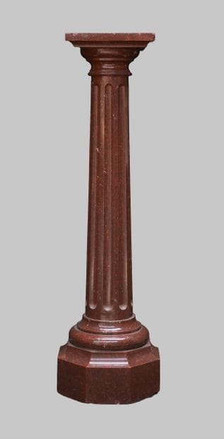 Fluted red marble column with an octagonal...