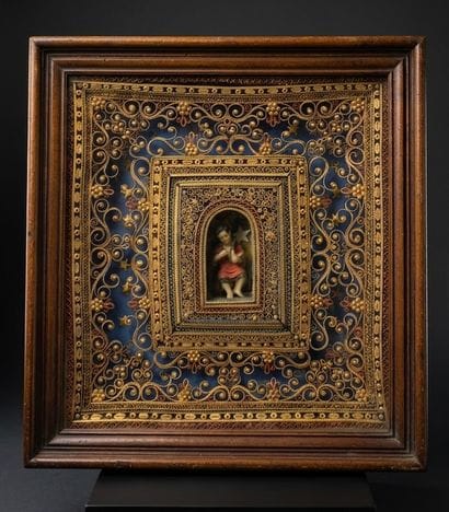 Paperolle reliquary with a central decoration...