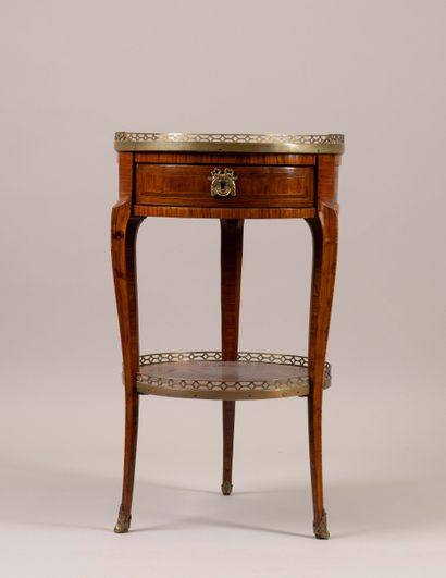 Circular table in rosewood veneer set within...