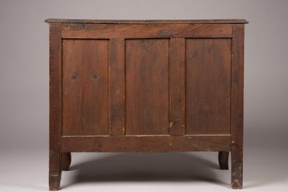 An “entre-deux” chest of drawers with a richly...