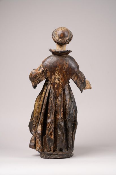 Carved, polychrome, and gilded wooden statue...