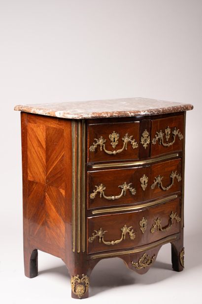 Mid-century chest of drawers with a curved...