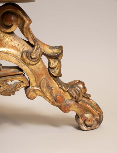 Molded, carved, and gilded wooden candelabra...