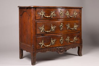 An “entre-deux” chest of drawers with a richly...