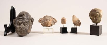 Set of five ancient heads, including one...