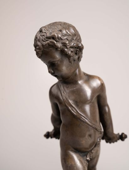 Two chiseled and patinated bronze putti,...