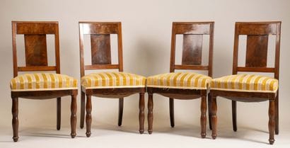 A set of four chairs with mahogany panel...