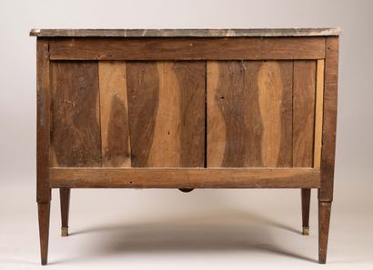 A sloping-top secretary desk made of molded...