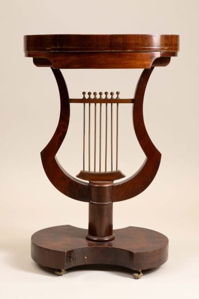 Oblong side table in mahogany and molded...