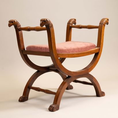 Curule stool in molded, turned, and carved...