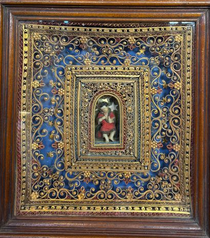 Paperolle reliquary with a central decoration...