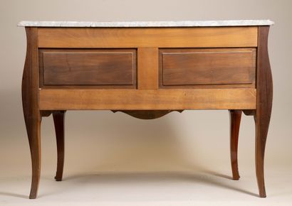 A Louis XV-style chest of drawers with two...