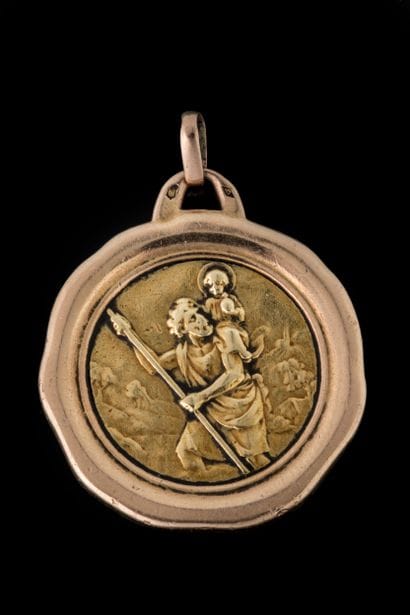 St. Christopher medal in the shape of a seal,...
