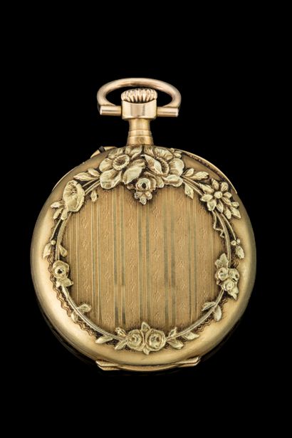 Small pocket or lapel watch with a yellow...
