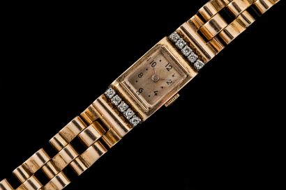 Women's yellow gold (750) wristwatch. Rectangular...