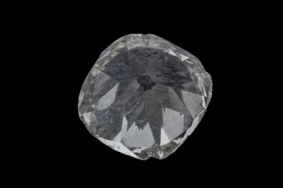 An antique-cut diamond (cushion square shape)...