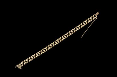 Yellow gold (750) curb chain bracelet. Rhinoceros...