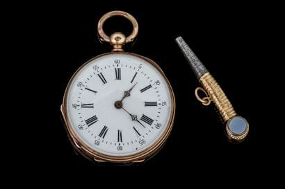 Small pocket watch with a yellow gold case...