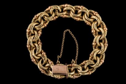 Bracelet anneaux ovales striés en or rose...