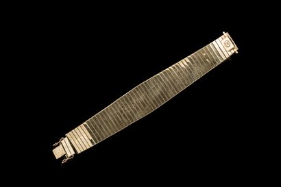 Ribbon bracelet with flat links featuring...