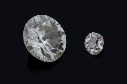 Antique-cut diamond on paper weighing approximately...