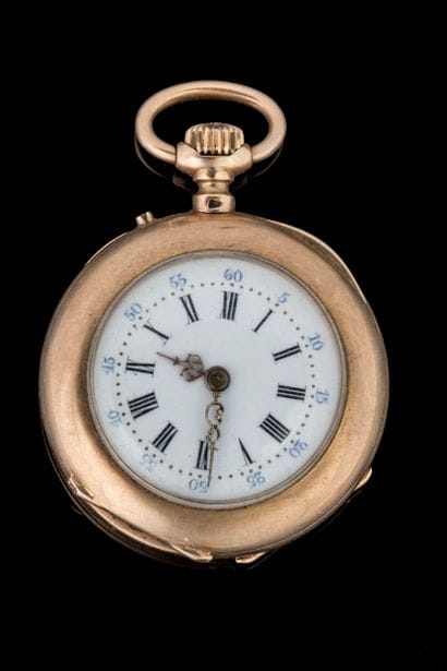 Small pocket watch with a yellow gold case...