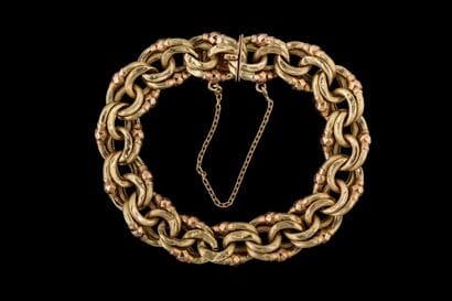 Bracelet anneaux ovales striés en or rose...