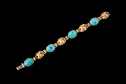 Bracelet adorned with four oval matrix turquoise...