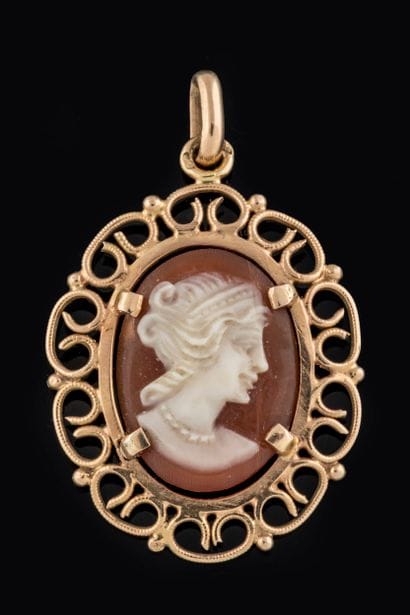 Pendant featuring a cameo with a woman's...