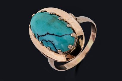 Marquise-shaped ring set with a matrix turquoise...