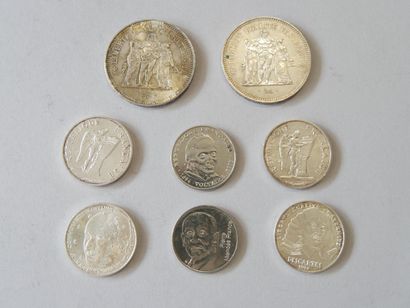 2 silver 50-franc coins, 4 100-franc coins,...
