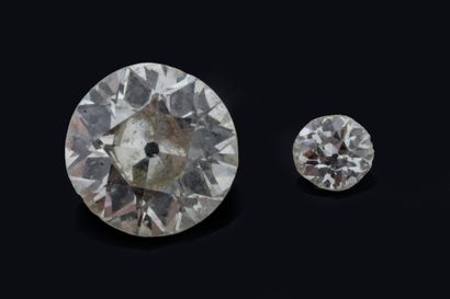 Antique-cut diamond on paper weighing approximately...