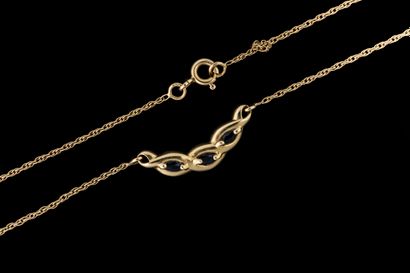 Necklace featuring a central braided design...