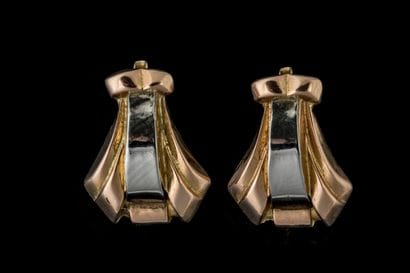 Pair of diamond-shaped earrings in white...