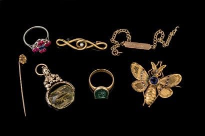 Set of worn jewelry with heavy scratches...