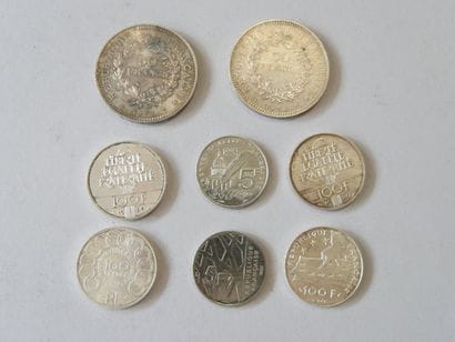 2 silver 50-franc coins, 4 100-franc coins,...