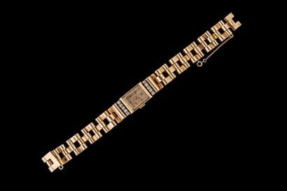 Women's yellow gold (750) wristwatch. Rectangular...