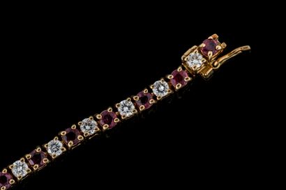Yellow gold (750) river or tennis bracelet...