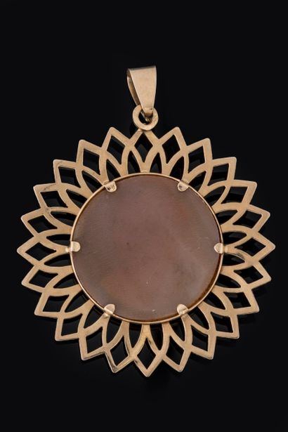 Openwork pendant featuring radiating ogives;...