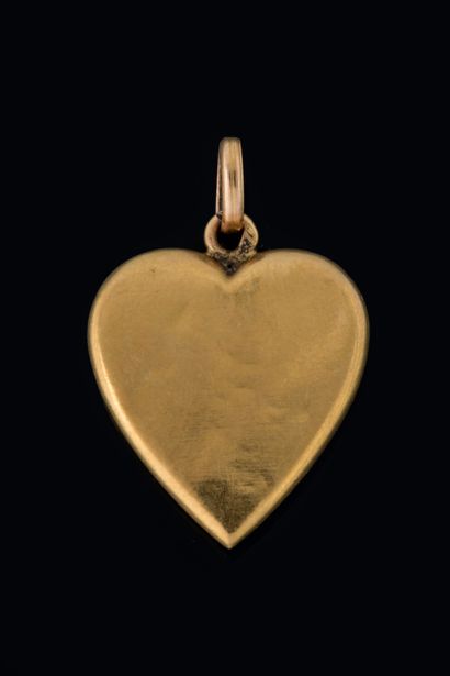 Yellow gold (750) heart pendant adorned with...